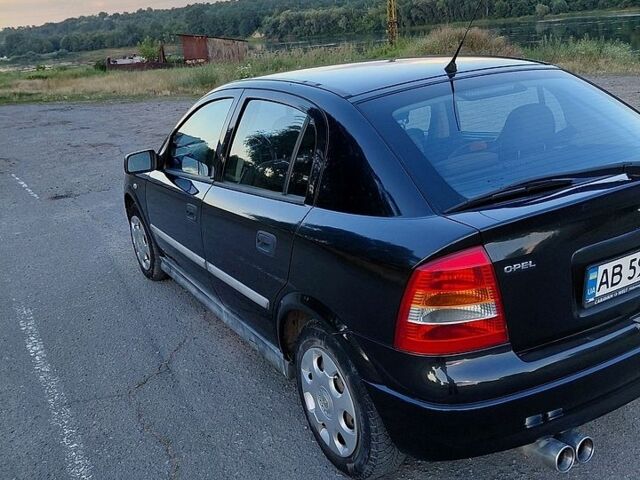 Черный Опель Астра, объемом двигателя 1.6 л и пробегом 221 тыс. км за 3200 $, фото 1 на Automoto.ua