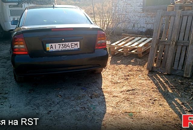 Чорний Опель Астра, об'ємом двигуна 18 л та пробігом 300 тис. км за 1300 $, фото 1 на Automoto.ua