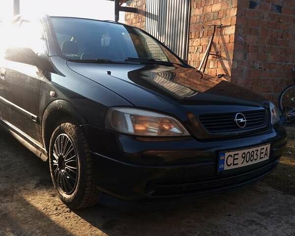 Черный Опель Астра, объемом двигателя 1.7 л и пробегом 413 тыс. км за 2400 $, фото 1 на Automoto.ua
