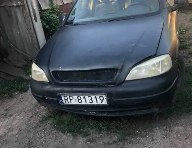Черный Опель Астра, объемом двигателя 2 л и пробегом 300 тыс. км за 1094 $, фото 1 на Automoto.ua