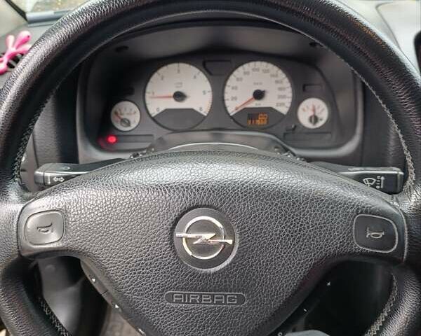 Черный Опель Астра, объемом двигателя 2 л и пробегом 311 тыс. км за 1650 $, фото 1 на Automoto.ua