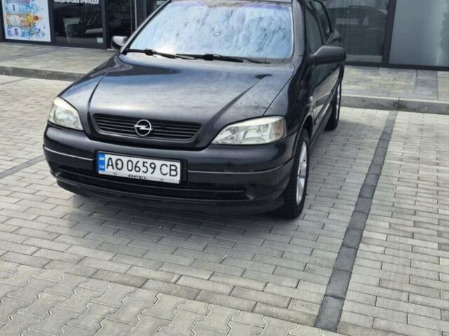 Черный Опель Астра, объемом двигателя 1.7 л и пробегом 296 тыс. км за 3400 $, фото 1 на Automoto.ua