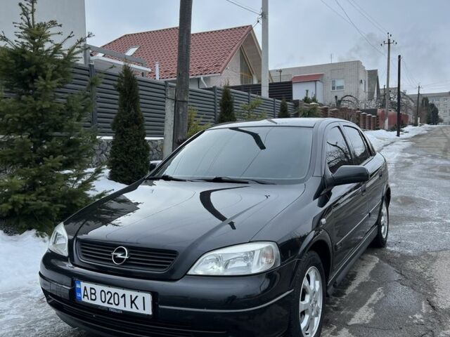 Черный Опель Астра, объемом двигателя 1.6 л и пробегом 202 тыс. км за 3650 $, фото 1 на Automoto.ua