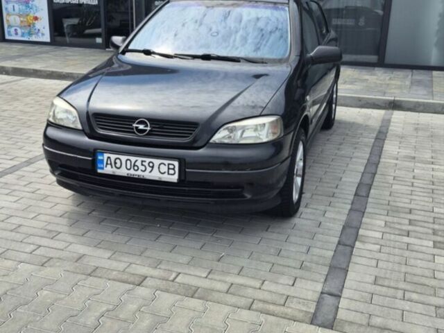 Черный Опель Астра, объемом двигателя 1.7 л и пробегом 296 тыс. км за 3400 $, фото 1 на Automoto.ua