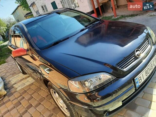 Черный Опель Астра, объемом двигателя 1.6 л и пробегом 224 тыс. км за 3500 $, фото 1 на Automoto.ua