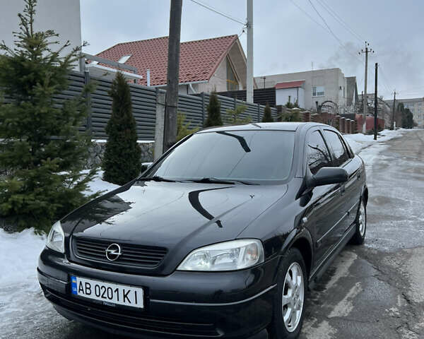 Черный Опель Астра, объемом двигателя 1.6 л и пробегом 202 тыс. км за 3650 $, фото 1 на Automoto.ua