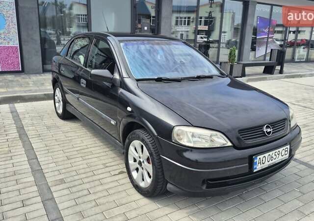 Черный Опель Астра, объемом двигателя 1.7 л и пробегом 296 тыс. км за 3600 $, фото 1 на Automoto.ua