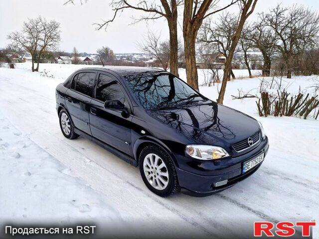 Черный Опель Астра, объемом двигателя 2 л и пробегом 384 тыс. км за 3000 $, фото 1 на Automoto.ua