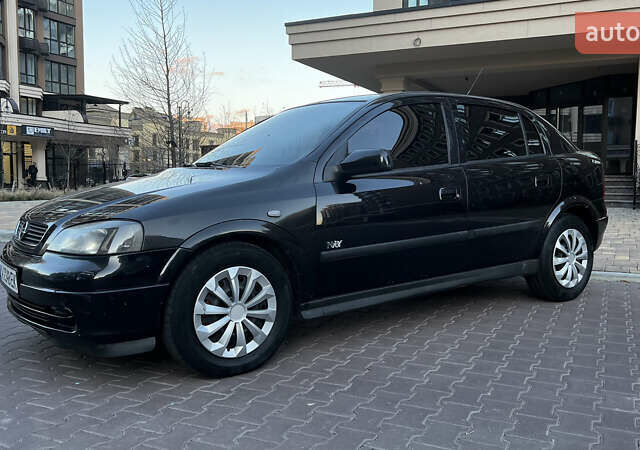 Чорний Опель Астра, об'ємом двигуна 2 л та пробігом 290 тис. км за 4700 $, фото 1 на Automoto.ua