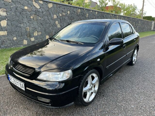 Черный Опель Астра, объемом двигателя 1.6 л и пробегом 218 тыс. км за 3500 $, фото 1 на Automoto.ua