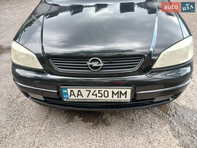 Черный Опель Астра, объемом двигателя 1.6 л и пробегом 240 тыс. км за 4000 $, фото 1 на Automoto.ua