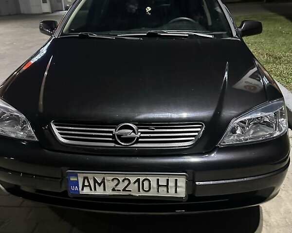 Черный Опель Астра, объемом двигателя 1.6 л и пробегом 232 тыс. км за 3900 $, фото 1 на Automoto.ua