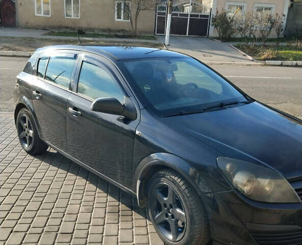 Черный Опель Астра, объемом двигателя 1.4 л и пробегом 200 тыс. км за 4700 $, фото 1 на Automoto.ua