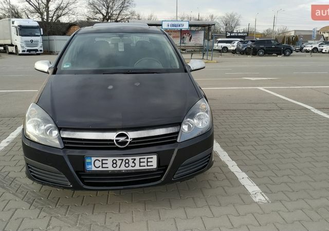 Черный Опель Астра, объемом двигателя 1.7 л и пробегом 327 тыс. км за 3300 $, фото 1 на Automoto.ua