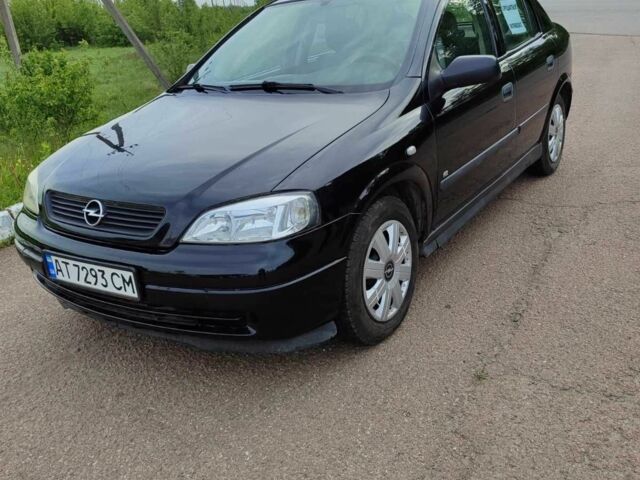 Черный Опель Астра, объемом двигателя 1.7 л и пробегом 298 тыс. км за 3700 $, фото 1 на Automoto.ua