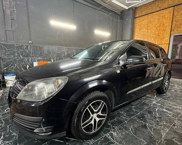 Черный Опель Астра, объемом двигателя 1.4 л и пробегом 219 тыс. км за 5000 $, фото 1 на Automoto.ua