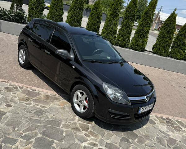 Черный Опель Астра, объемом двигателя 1.36 л и пробегом 220 тыс. км за 4450 $, фото 1 на Automoto.ua