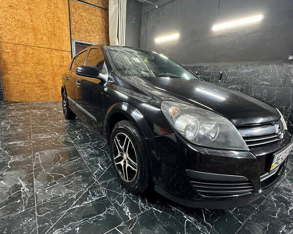 Черный Опель Астра, объемом двигателя 1.4 л и пробегом 220 тыс. км за 4700 $, фото 1 на Automoto.ua