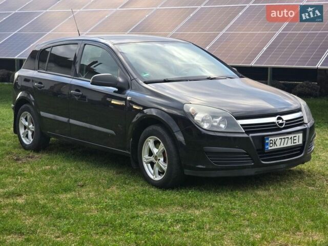 Черный Опель Астра, объемом двигателя 1.4 л и пробегом 210 тыс. км за 5200 $, фото 1 на Automoto.ua