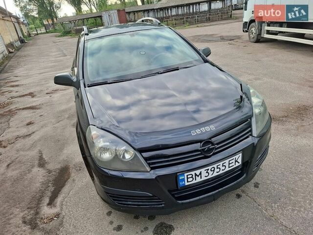 Черный Опель Астра, объемом двигателя 1.4 л и пробегом 318 тыс. км за 4000 $, фото 1 на Automoto.ua
