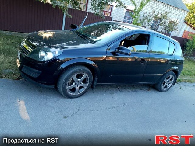 Черный Опель Астра, объемом двигателя 1.4 л и пробегом 203 тыс. км за 4800 $, фото 1 на Automoto.ua