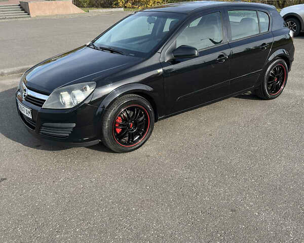 Черный Опель Астра, объемом двигателя 1.6 л и пробегом 247 тыс. км за 4800 $, фото 1 на Automoto.ua