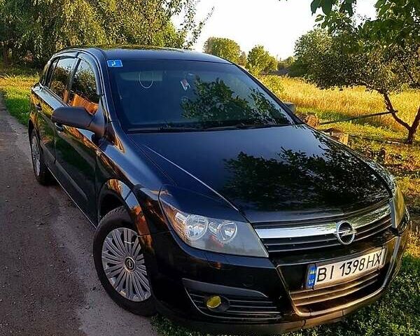 Черный Опель Астра, объемом двигателя 1.4 л и пробегом 290 тыс. км за 5000 $, фото 1 на Automoto.ua
