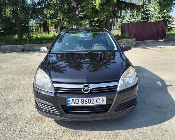 Черный Опель Астра, объемом двигателя 1.4 л и пробегом 176 тыс. км за 4000 $, фото 1 на Automoto.ua