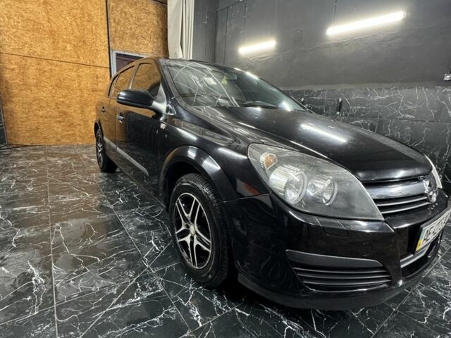 Черный Опель Астра, объемом двигателя 1.4 л и пробегом 220 тыс. км за 4500 $, фото 1 на Automoto.ua