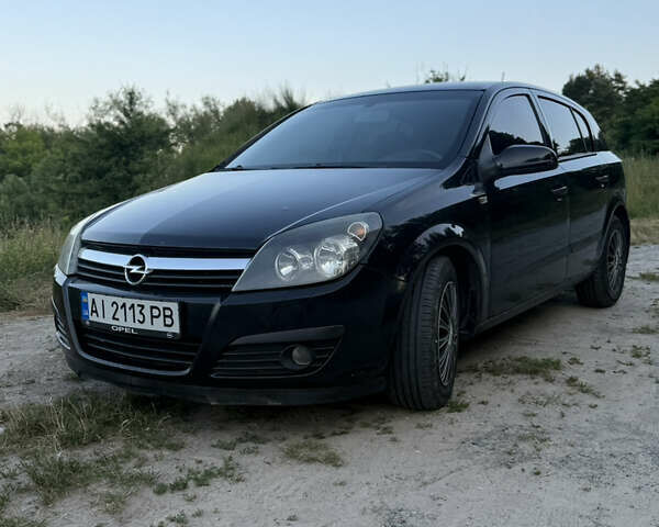 Черный Опель Астра, объемом двигателя 1.6 л и пробегом 207 тыс. км за 4200 $, фото 1 на Automoto.ua