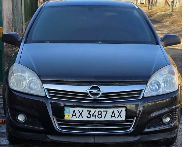 Черный Опель Астра, объемом двигателя 1.4 л и пробегом 213 тыс. км за 4650 $, фото 1 на Automoto.ua