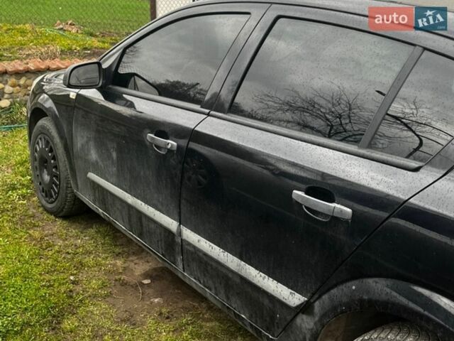 Черный Опель Астра, объемом двигателя 1.42 л и пробегом 190 тыс. км за 4500 $, фото 1 на Automoto.ua