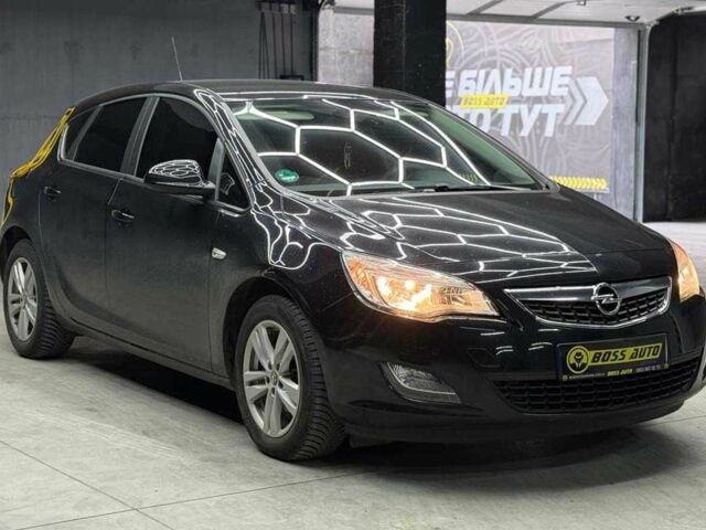 Черный Опель Астра, объемом двигателя 1.6 л и пробегом 180 тыс. км за 7700 $, фото 1 на Automoto.ua