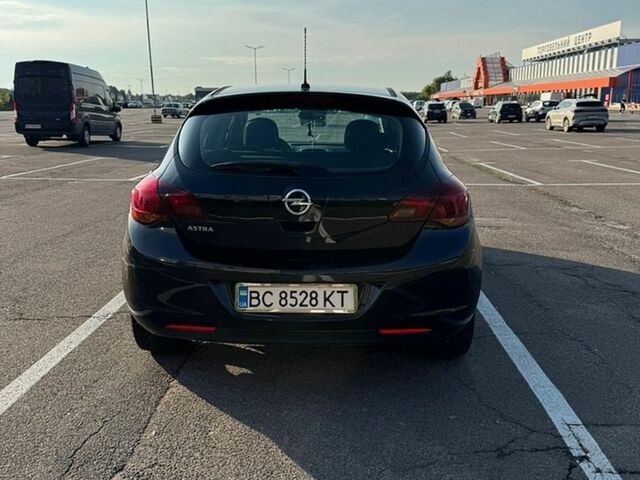 Черный Опель Астра, объемом двигателя 1.3 л и пробегом 236 тыс. км за 5800 $, фото 1 на Automoto.ua