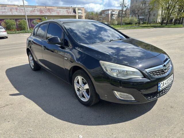 Черный Опель Астра, объемом двигателя 1.2 л и пробегом 256 тыс. км за 4600 $, фото 1 на Automoto.ua