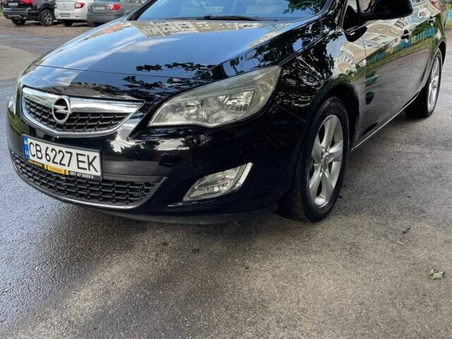 Черный Опель Астра, объемом двигателя 1.7 л и пробегом 245 тыс. км за 7300 $, фото 1 на Automoto.ua