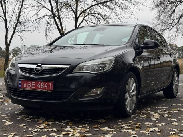 Чорний Опель Астра, об'ємом двигуна 1.4 л та пробігом 124 тис. км за 8607 $, фото 1 на Automoto.ua