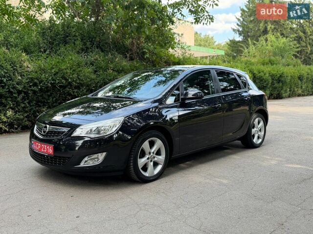 Черный Опель Астра, объемом двигателя 1.4 л и пробегом 216 тыс. км за 7300 $, фото 1 на Automoto.ua