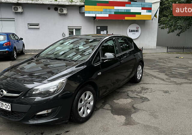 Черный Опель Астра, объемом двигателя 1.2 л и пробегом 235 тыс. км за 6500 $, фото 1 на Automoto.ua