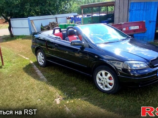 Черный Опель Астра, объемом двигателя 1.8 л и пробегом 200 тыс. км за 4000 $, фото 1 на Automoto.ua