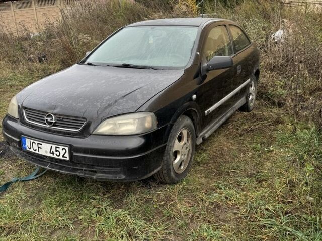 Черный Опель Астра, объемом двигателя 2 л и пробегом 222 тыс. км за 750 $, фото 1 на Automoto.ua