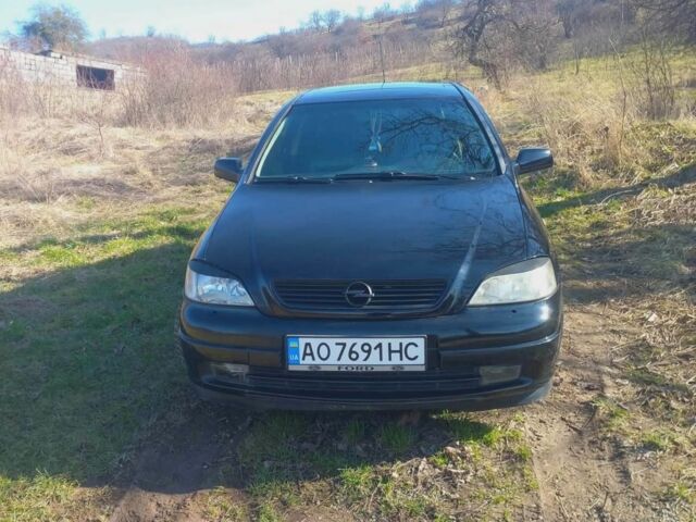 Чорний Опель Астра, об'ємом двигуна 2 л та пробігом 200 тис. км за 2000 $, фото 1 на Automoto.ua