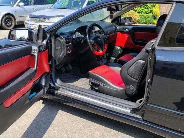 Чорний Опель Астра, об'ємом двигуна 2 л та пробігом 165 тис. км за 6499 $, фото 1 на Automoto.ua