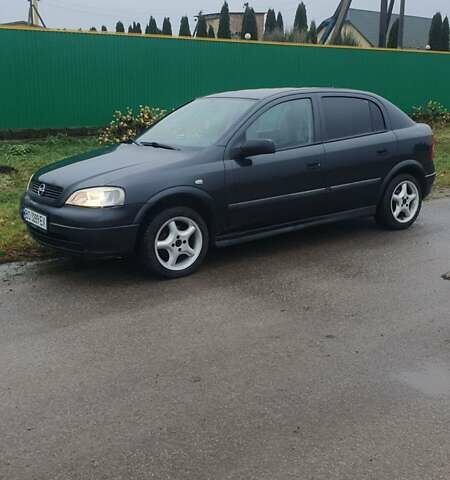 Черный Опель Астра, объемом двигателя 1.6 л и пробегом 171 тыс. км за 2199 $, фото 1 на Automoto.ua