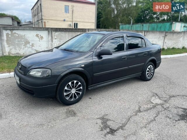 Черный Опель Астра, объемом двигателя 1.39 л и пробегом 399 тыс. км за 1950 $, фото 1 на Automoto.ua