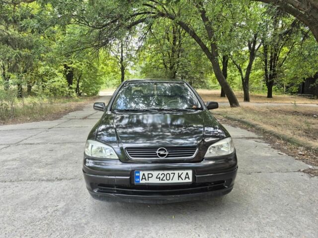 Черный Опель Астра, объемом двигателя 1.6 л и пробегом 202 тыс. км за 2200 $, фото 1 на Automoto.ua