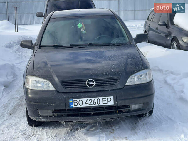 Черный Опель Астра, объемом двигателя 1.6 л и пробегом 300 тыс. км за 1600 $, фото 1 на Automoto.ua