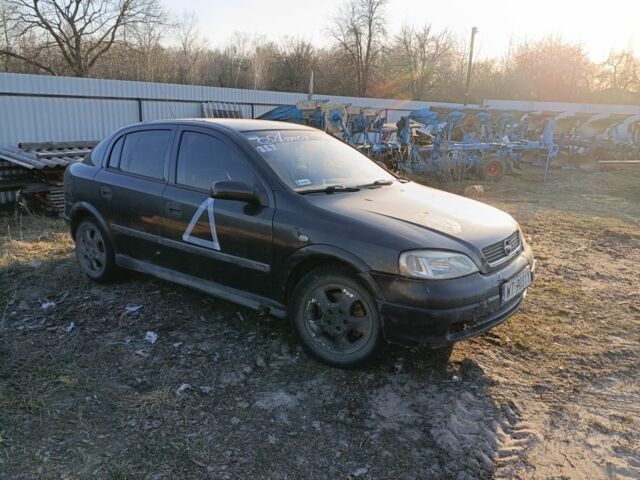 Черный Опель Астра, объемом двигателя 2 л и пробегом 200 тыс. км за 700 $, фото 1 на Automoto.ua