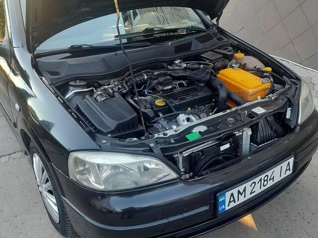 Черный Опель Астра, объемом двигателя 1.69 л и пробегом 315 тыс. км за 2950 $, фото 1 на Automoto.ua