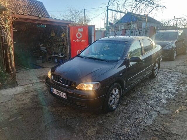 Черный Опель Астра, объемом двигателя 1.8 л и пробегом 330 тыс. км за 3400 $, фото 1 на Automoto.ua